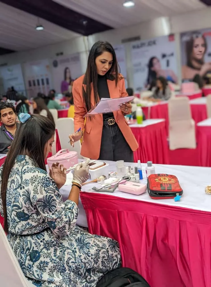 Live technical assessment at a professional nail competition